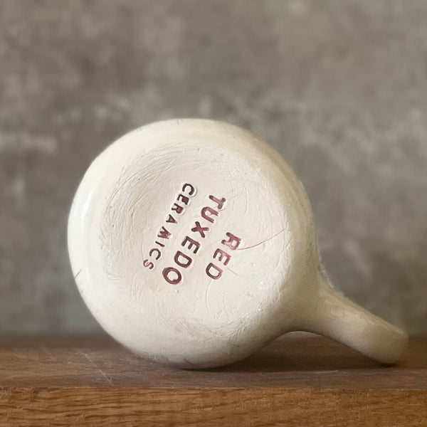 Ceramic coffee mug with quote by Kafka
