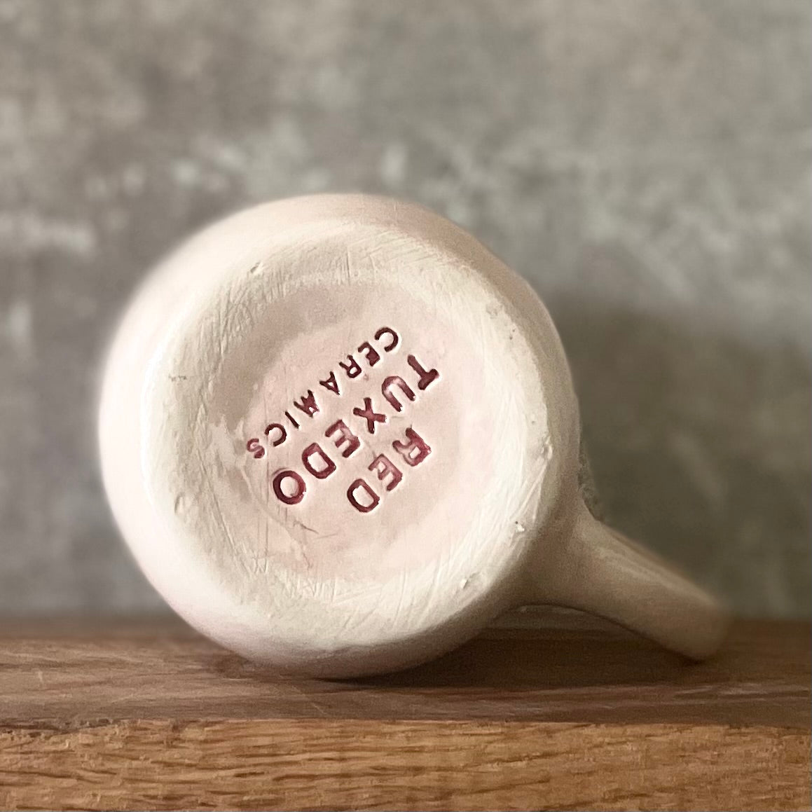 Pink mug with saying in Lithuanian