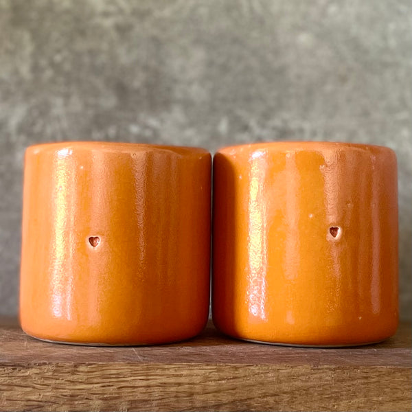Lovely bright orange mugs with Italian love words