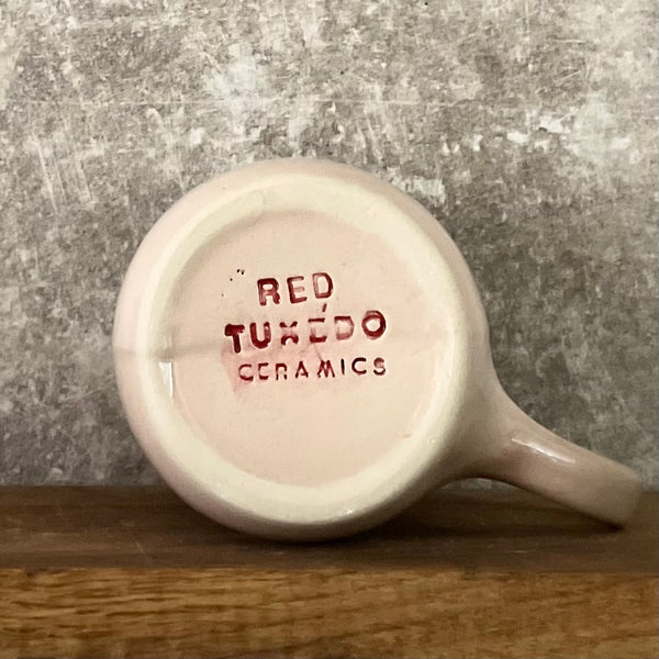 Pink big mug with saying in Lithuanian