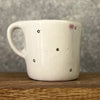 Small mug with magic words and little stars