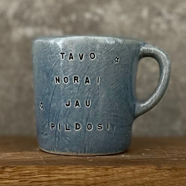 Small blue mug with magic words