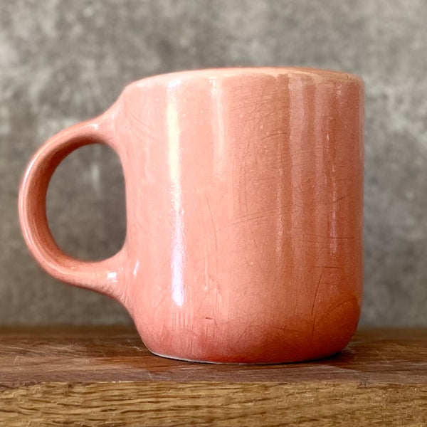 Red mug with funny phrase in Lithuanian