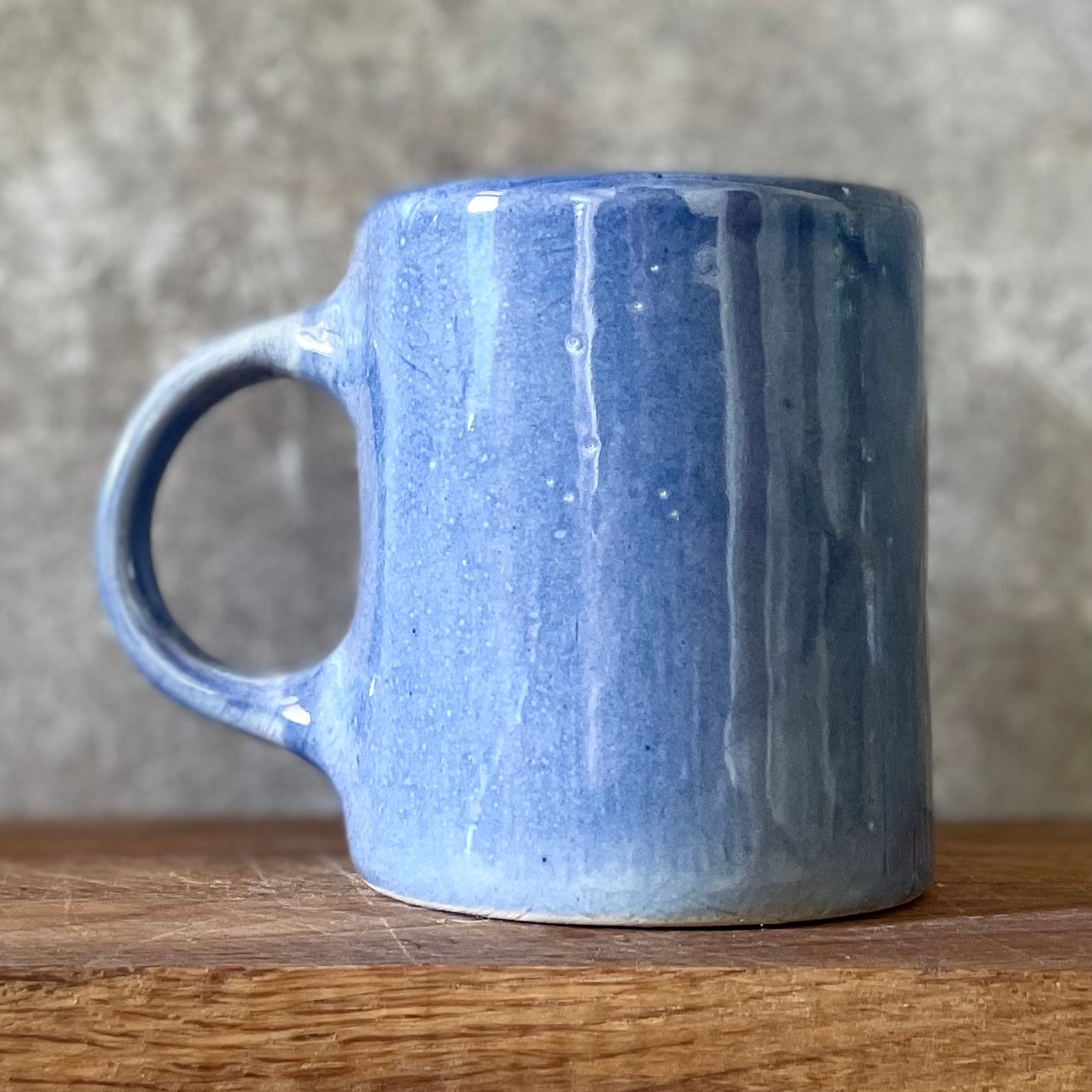 Blue mug with funny phrase in Lithuanian