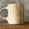 Brownish mug with funny saying