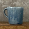 Small blue mug with magic words