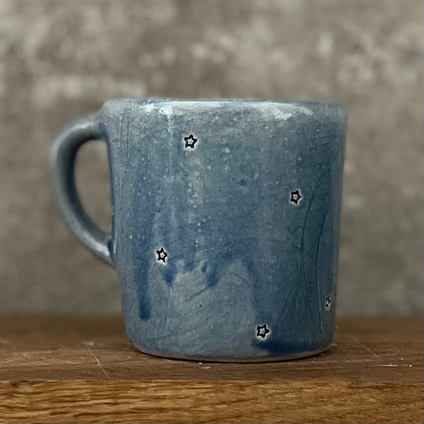 Small blue mug with magic words