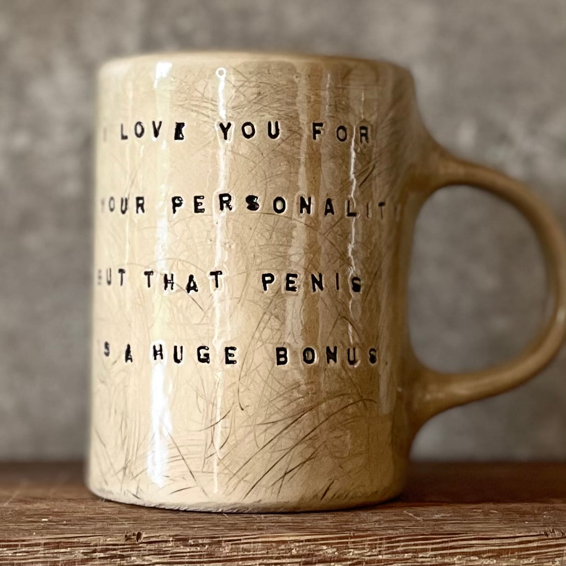 Brownish mug with funny saying