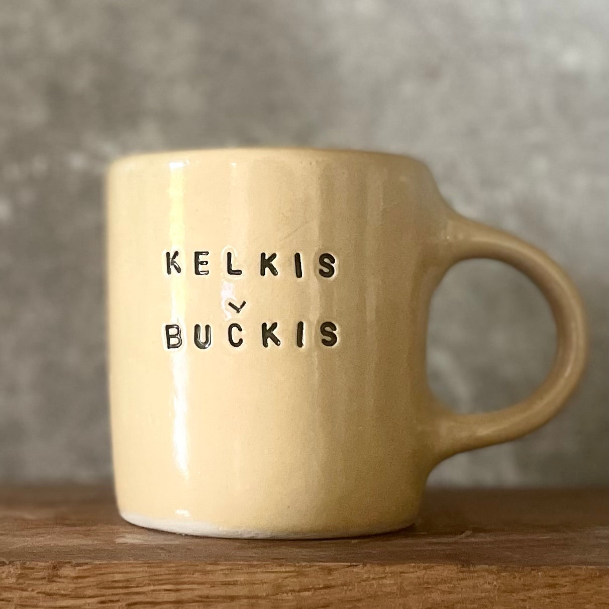 Puodelis geltonas KELKIS BUČKIS