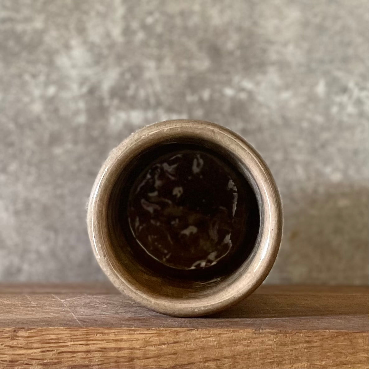 Brown mug with Nietzsche quote