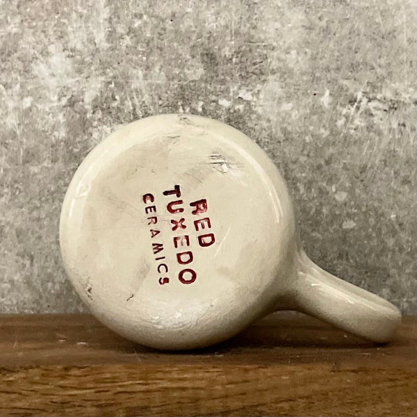 White medium ceramic mug with words about work - twin