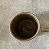Dark brown tumbler mug with words about work