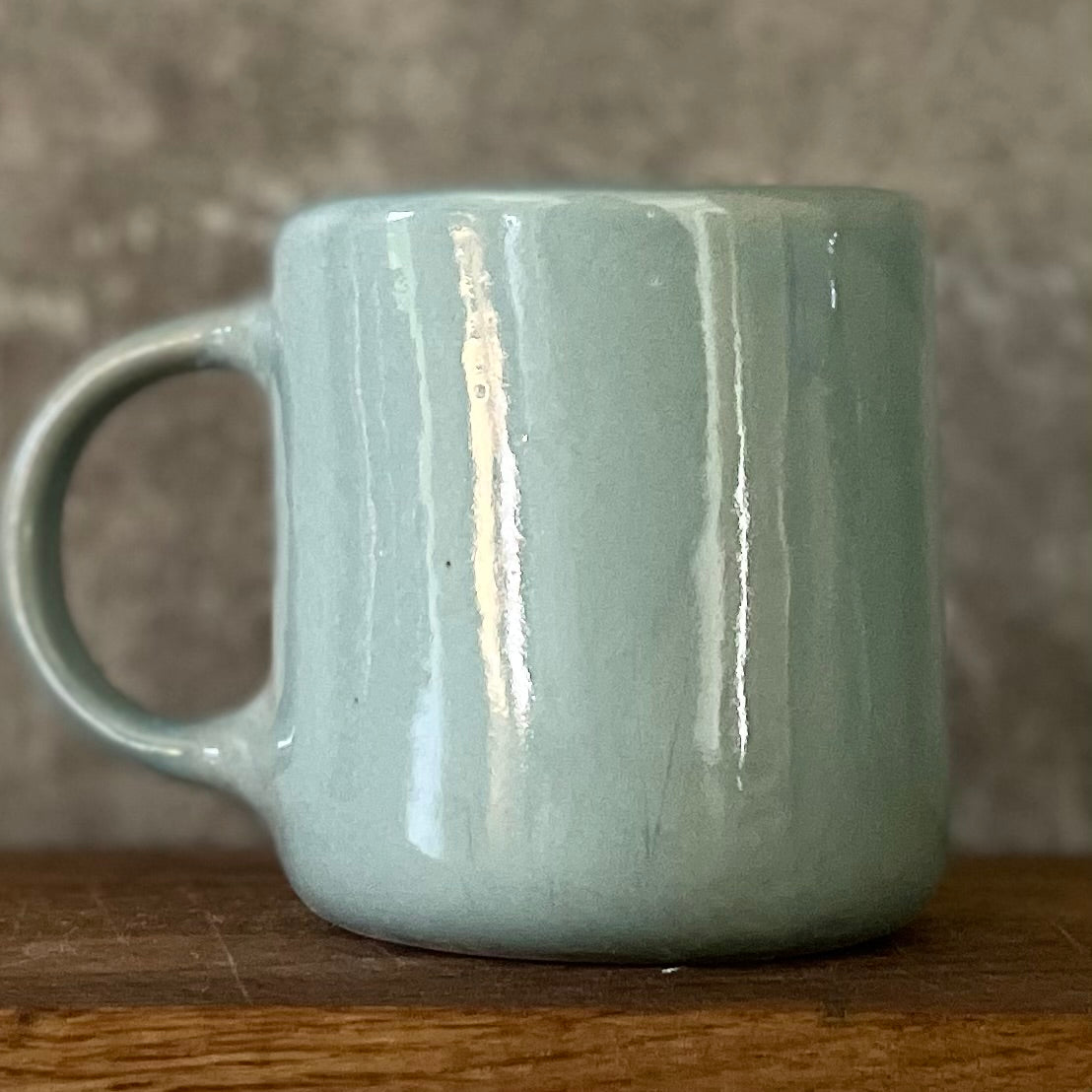 Blue mug with funny phrase in Lithuanian