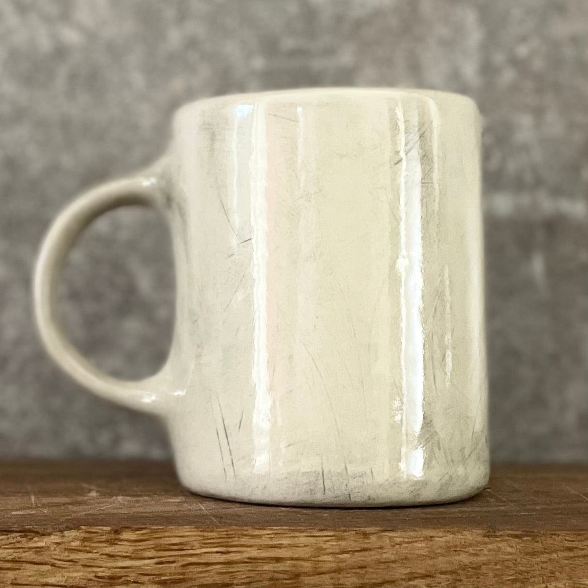 White mug with motivational saying