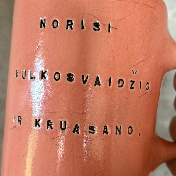 Pink mug with funny phrase in Lithuanian