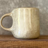 Ceramic mug with words about work