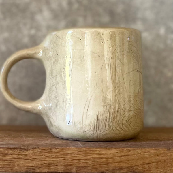 Ceramic mug with words about work