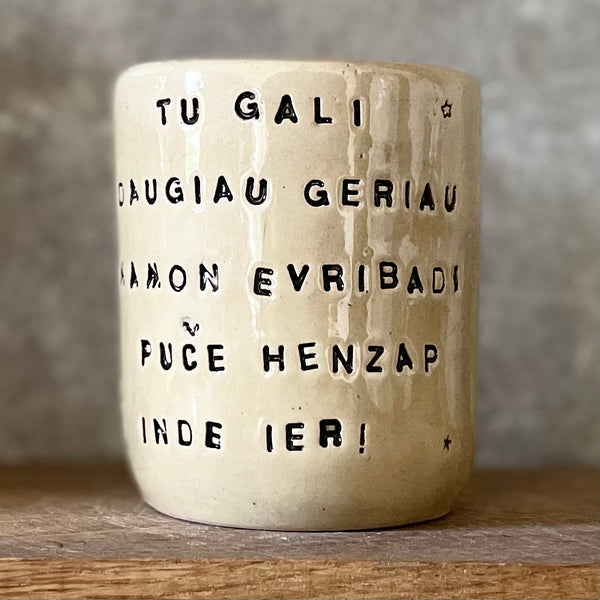 Beige mug with funny phrase in Lithuanian