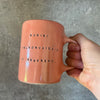 Pink mug with funny phrase in Lithuanian