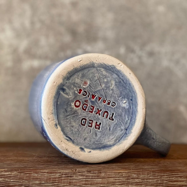 Blue heavy coffee mug with quote by Vergil