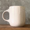 Pink mug with saying in Lithuanian
