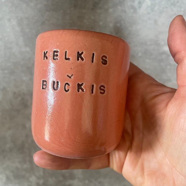 Raudonas puodelis "Kelkis, bučkis" 150 ml