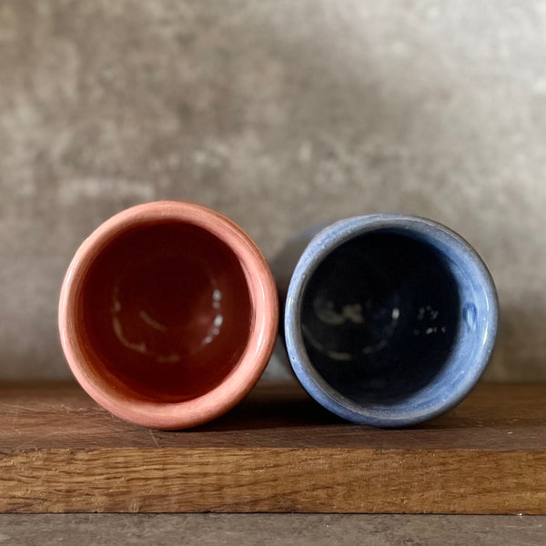 Two small mugs DABAR and CIA