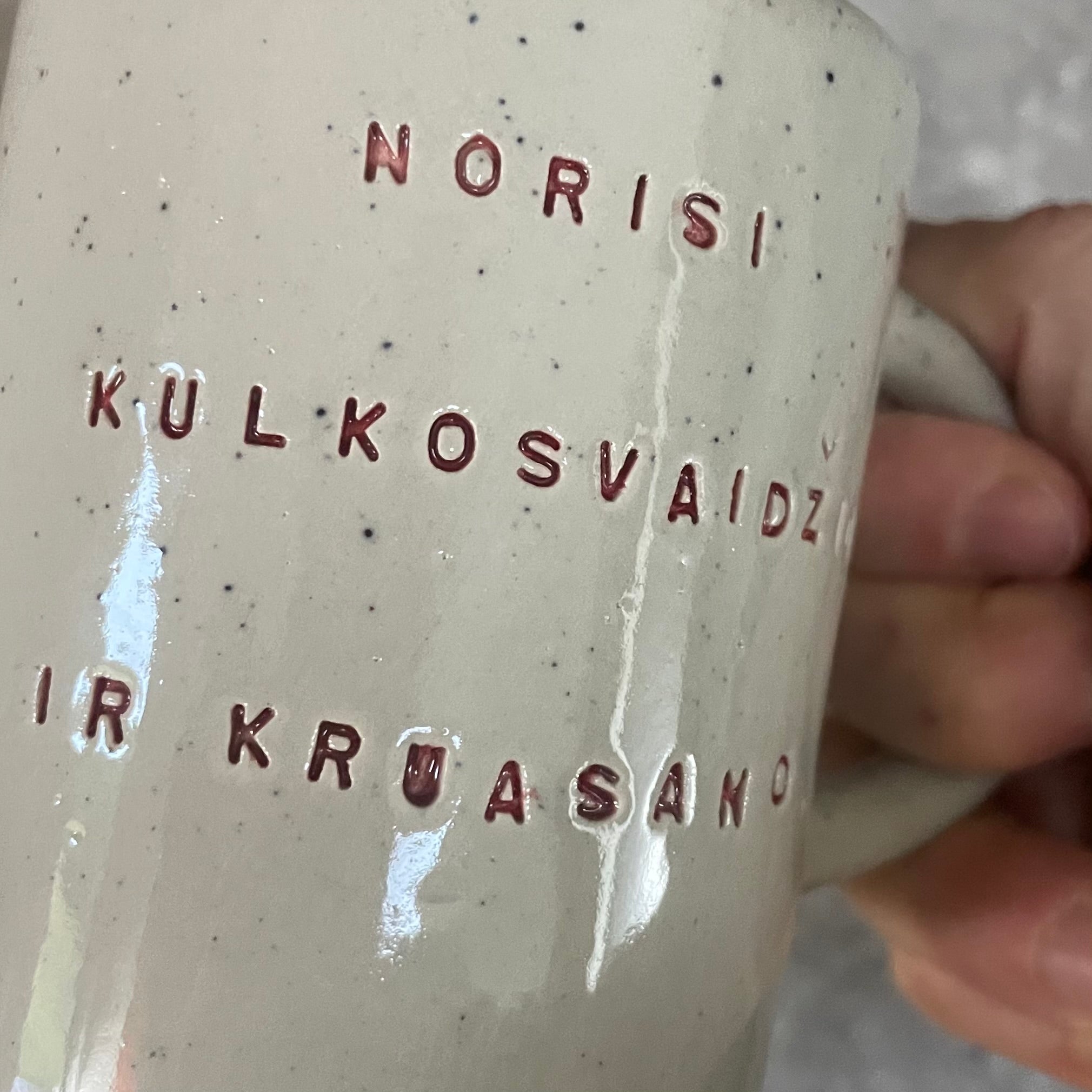 Speckled mug about croissants