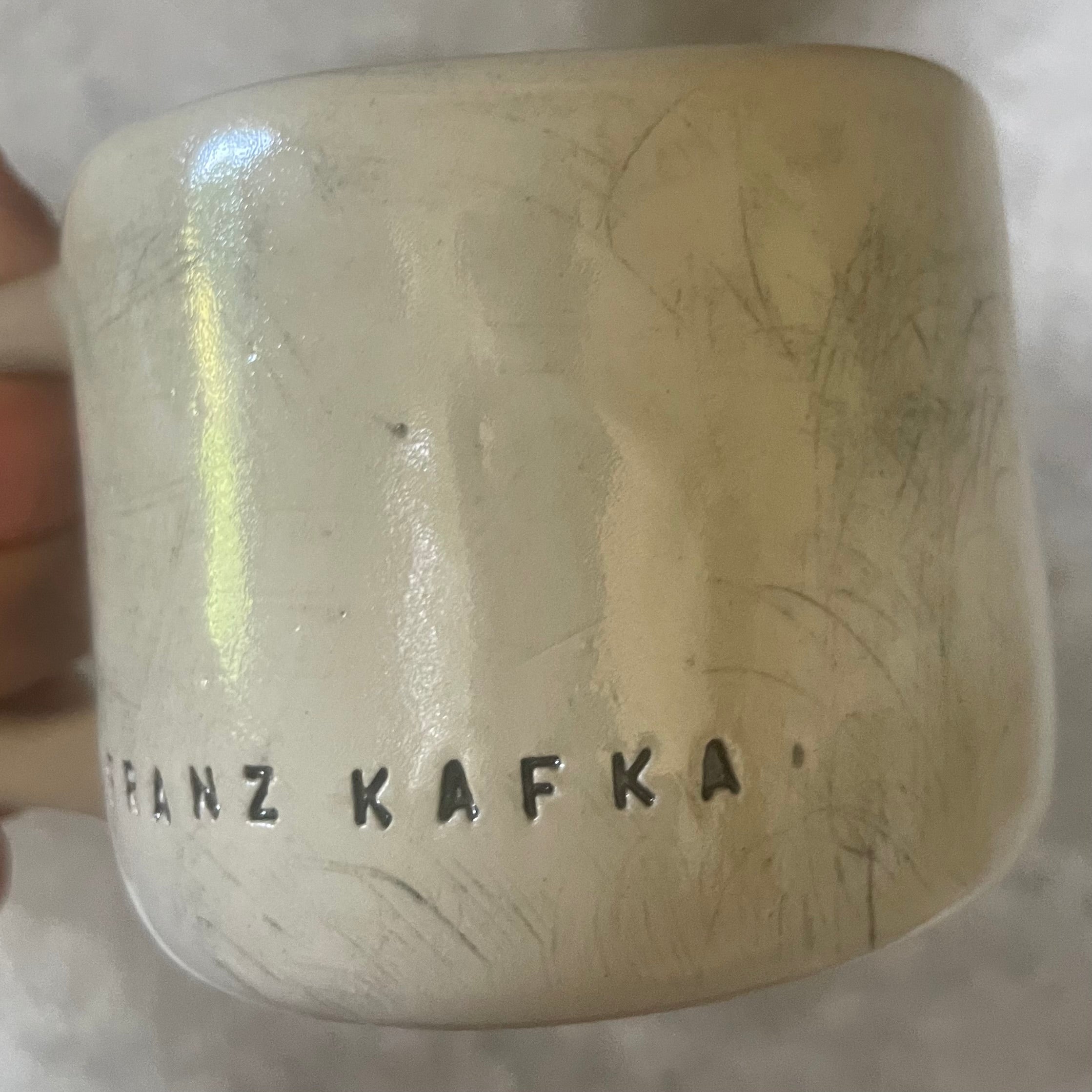 Ceramic coffee mug with quote by Kafka