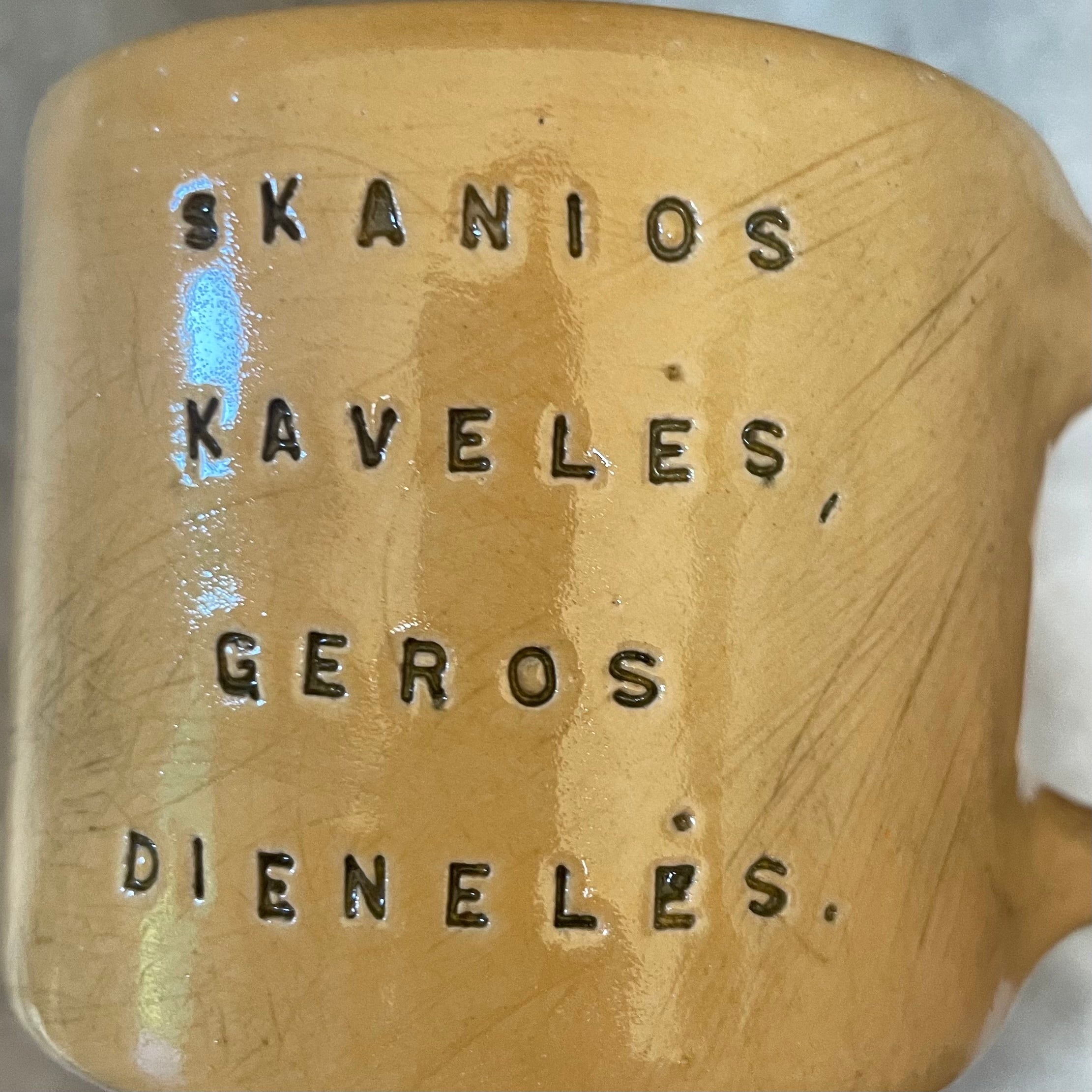 Yellow mug with good wishes