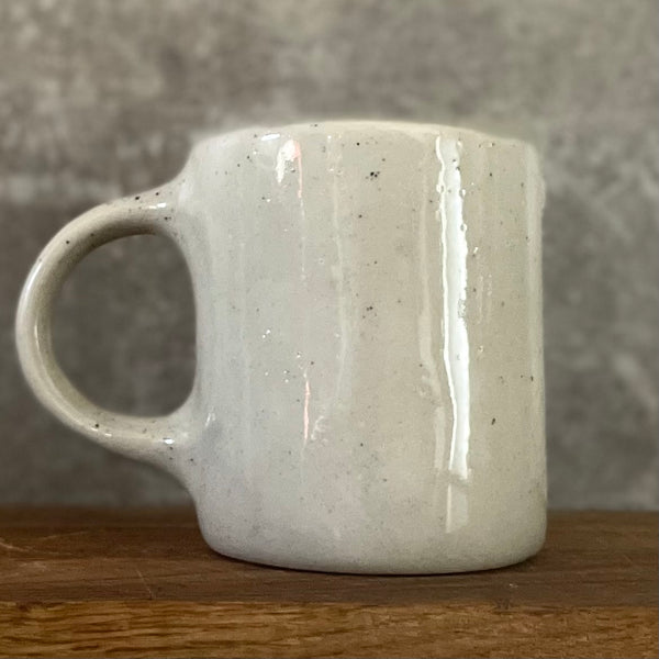 Speckled mug about croissants