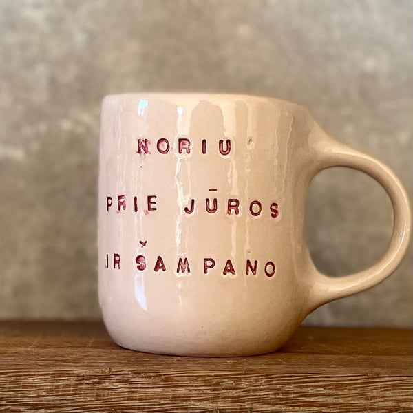 Rausvas puodelis ŠAMPANO