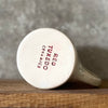 Speckled gray mug about music