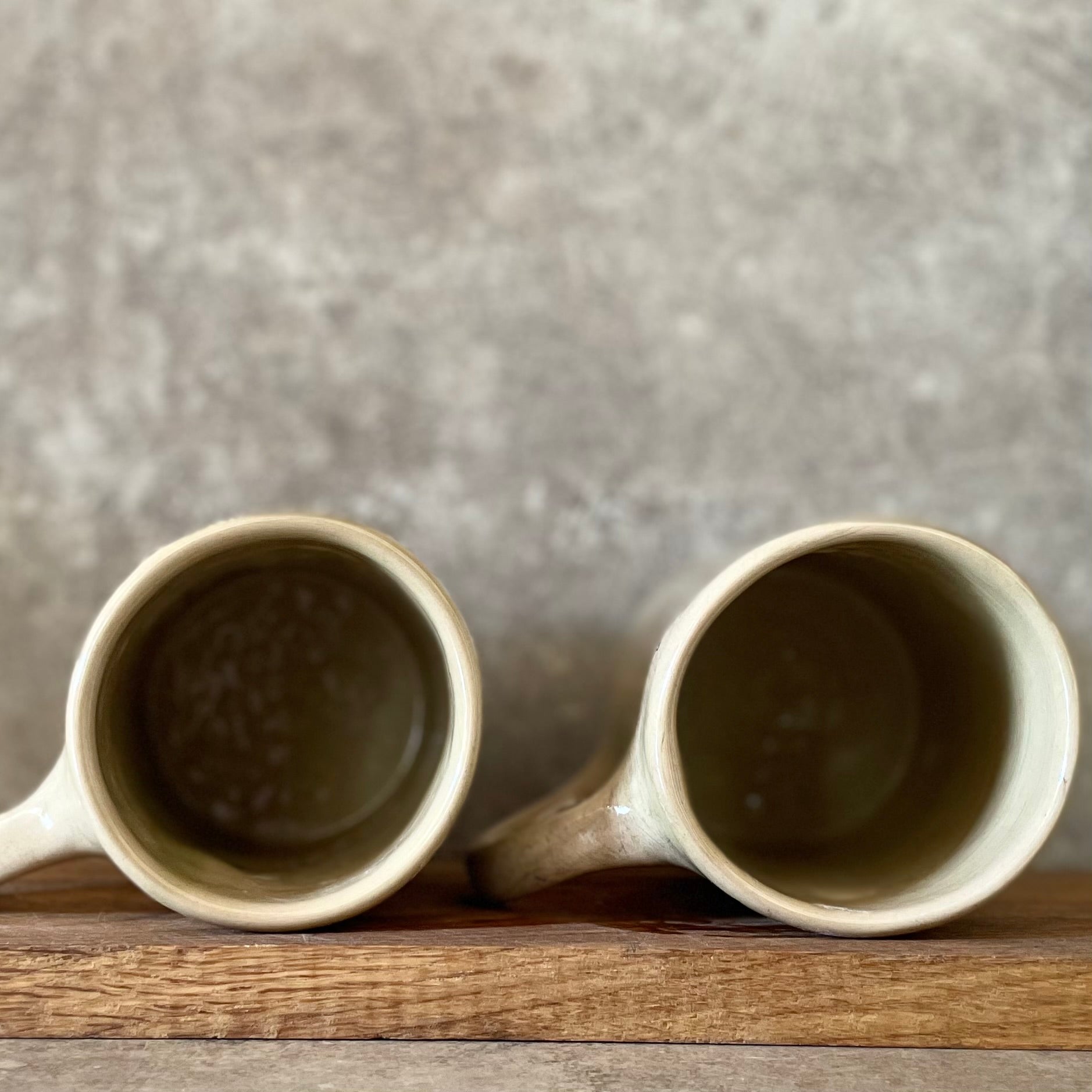 A pair of big ceramic mugs for work and home