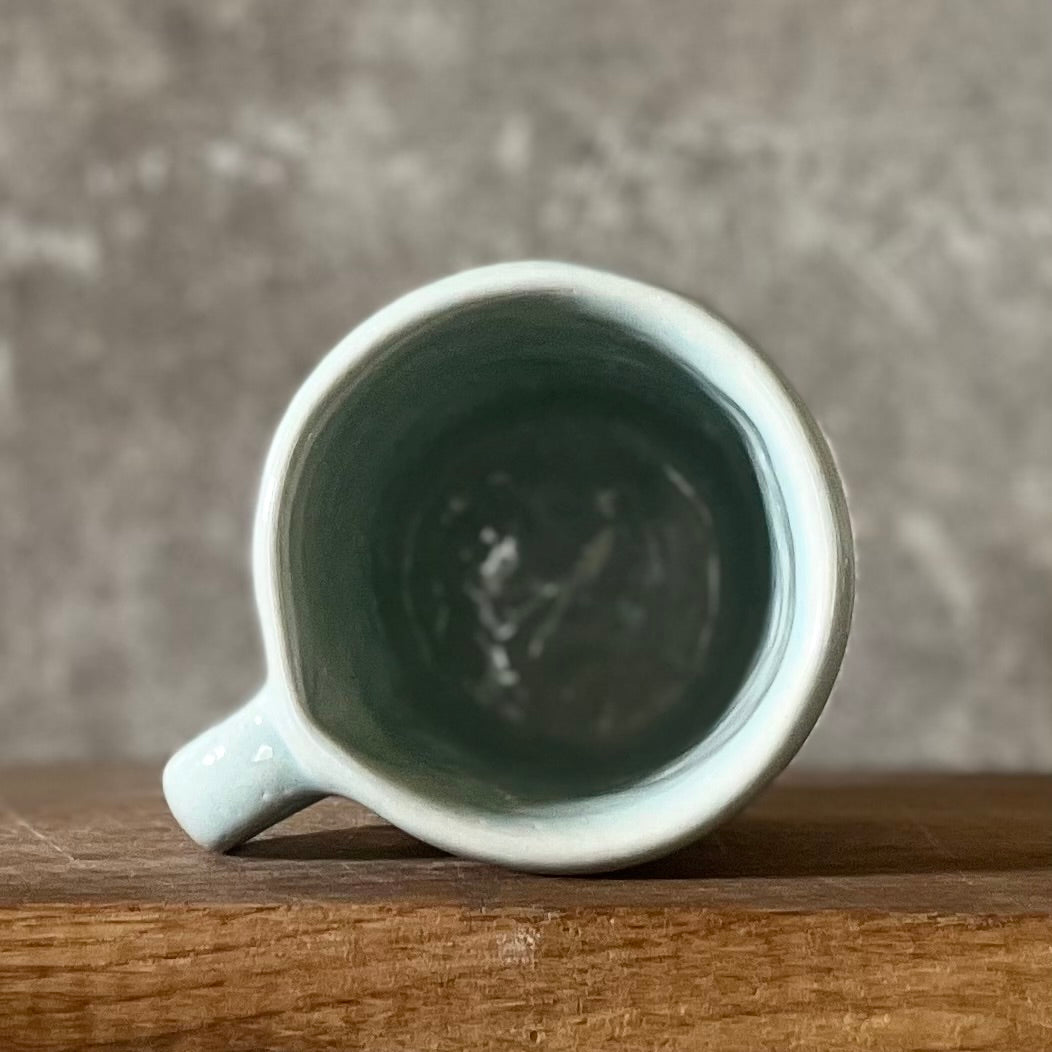 Melsvas mažas puodelis NORIU ŠAMPANO