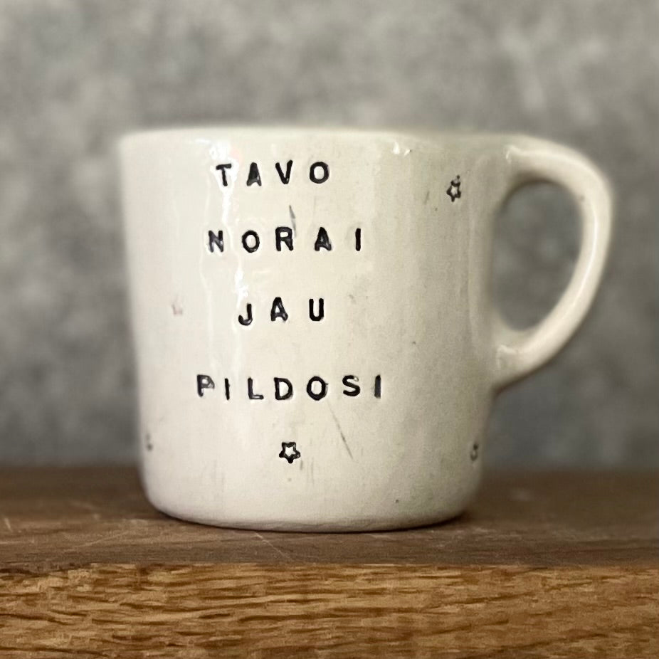 Small mug with magic words and little stars