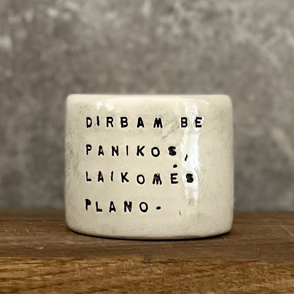 Small espresso mug with words about work