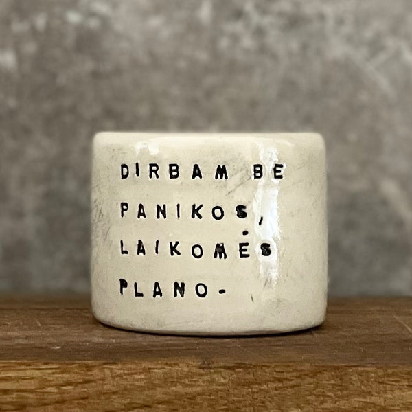Small espresso mug with words about work