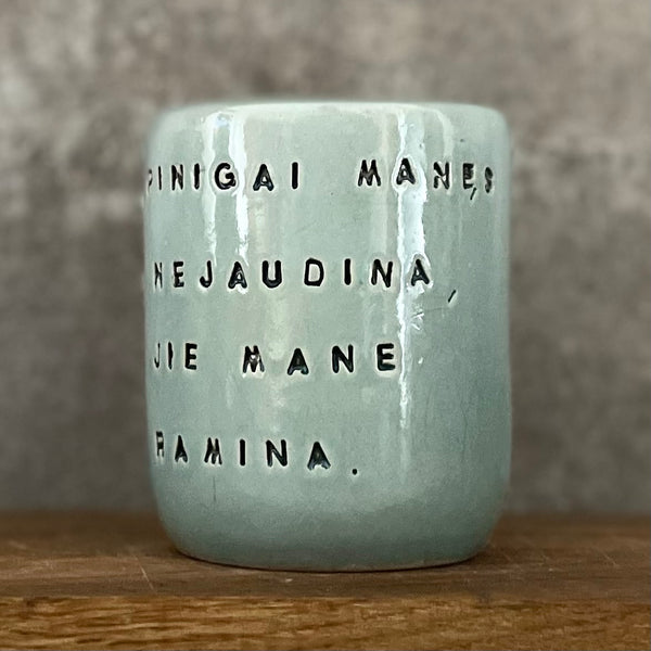 Ceramic mug about money