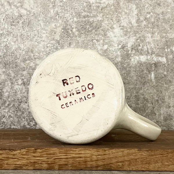 White mug with motivational saying