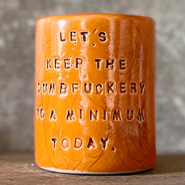 Bright orange tumbler mug