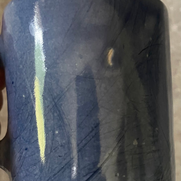 Blue ceramic mug about luck