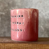 Pink mug with calming words without handle