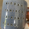 Puodelis apie darbą ir planavimą žalsvas