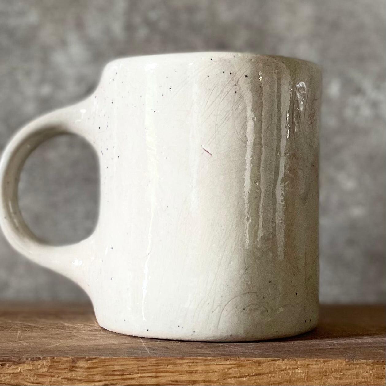 Speckled gray mug about music