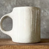 Speckled gray mug about music