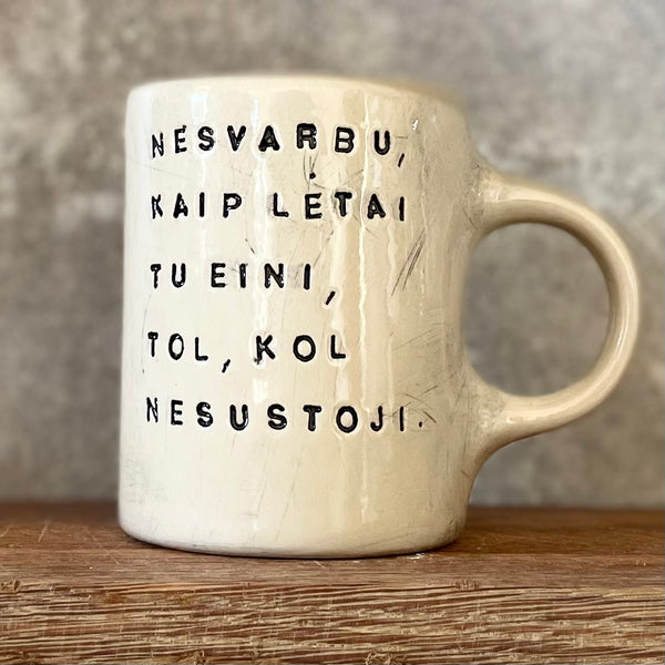 Puodelis su Konfucijaus citata