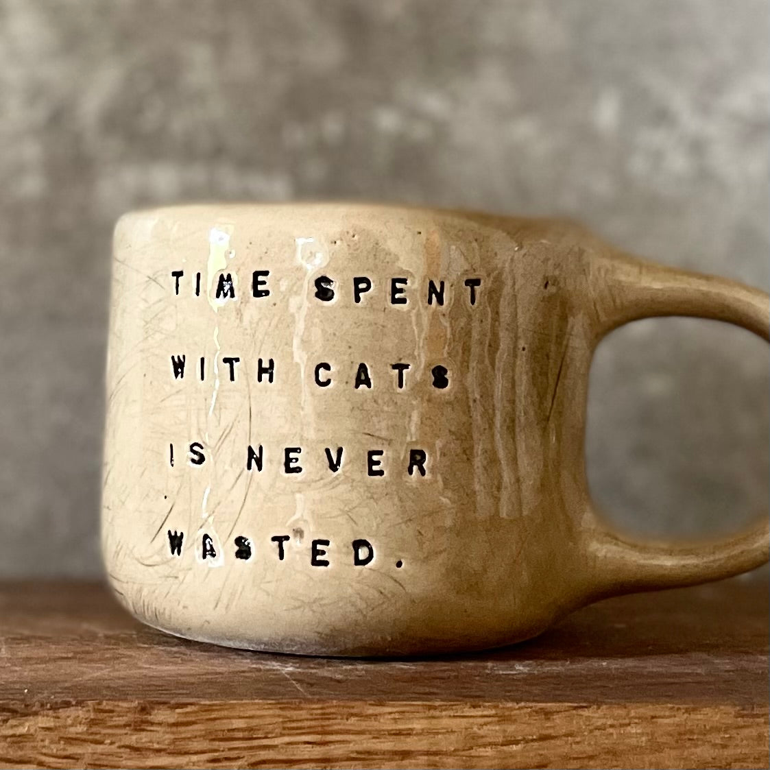 Mug with quote about cats