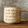 Mug with quote about cats
