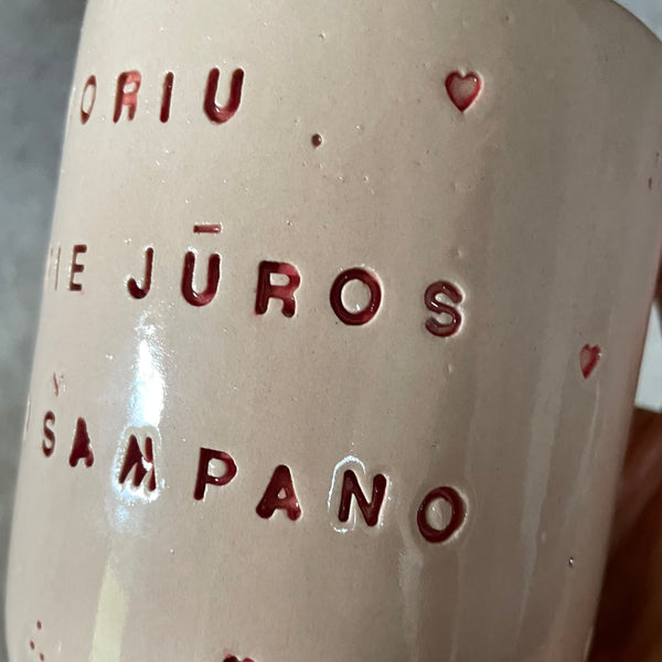 Mug about champagne with hearts